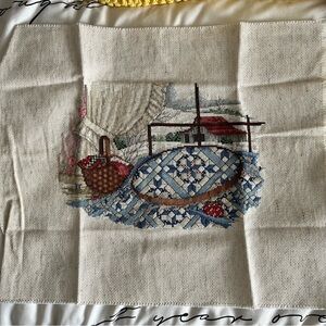 Handcrafted Cross-Stitch Quilt Design